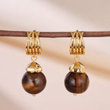À qui offrir des boucles d'oreilles Œil de Tigre ? - Biloria