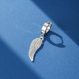 Boucles d'Oreilles Pendent Ailes Argentées | Bijou Homme Liberté - Biloria
