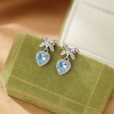 Boucles d'oreilles Topaze bleue et Nœud d'Amour - Argent S925 - Biloria