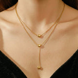 Collier Cœur Cascade d'Amour en Acier Doré - Biloria