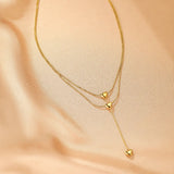 Collier Cœur Cascade d'Amour en Acier Doré - Biloria