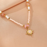 Collier Rhodonite et Cristal Fraise avec Pendentif Soleil - Biloria